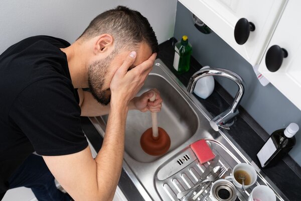 How Sediment Build-Up Causes Drain Blockages