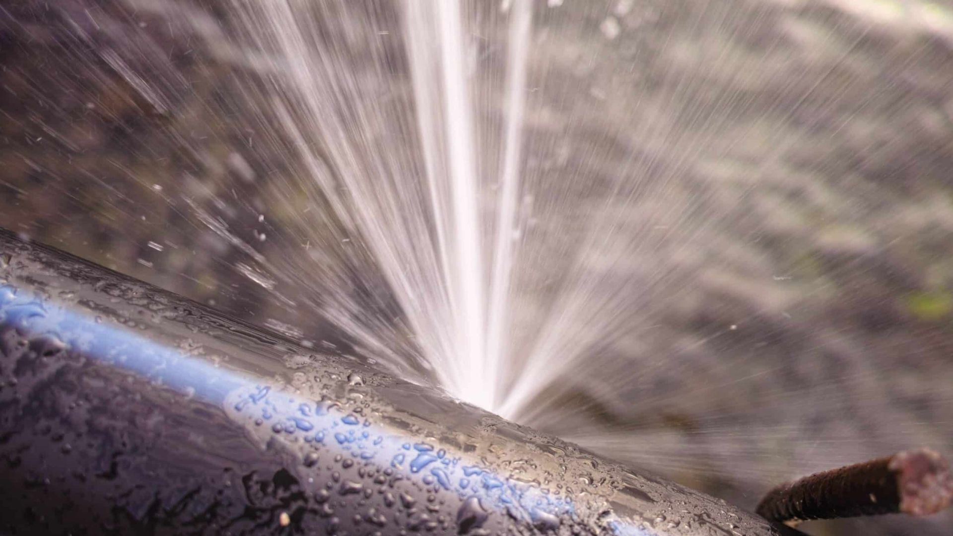 Burst Pipe Spraying Water